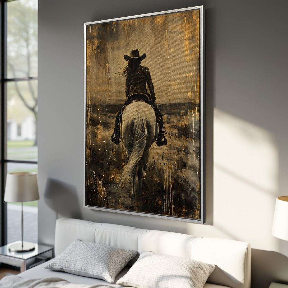 Framed Wall Art: Abstract painting of a cowgirl on a horse, in a gold and black color palette. Modern decor for your bedroom.