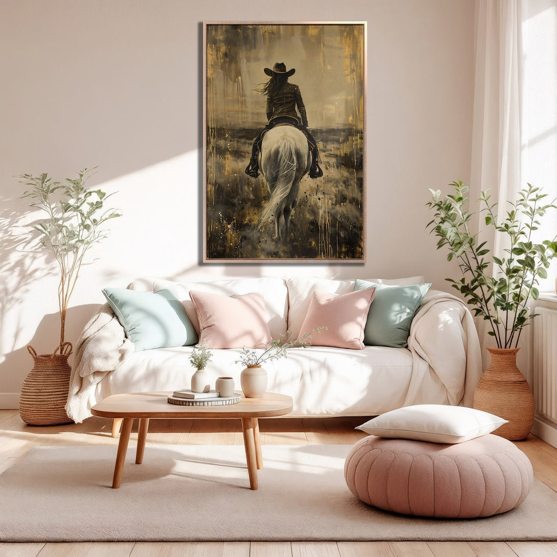 Framed Wall Art: Stunning canvas print of a cowgirl on a white horse, in a modern, abstract style. Earthy tones of gold, black, and beige. Perfect home decor!