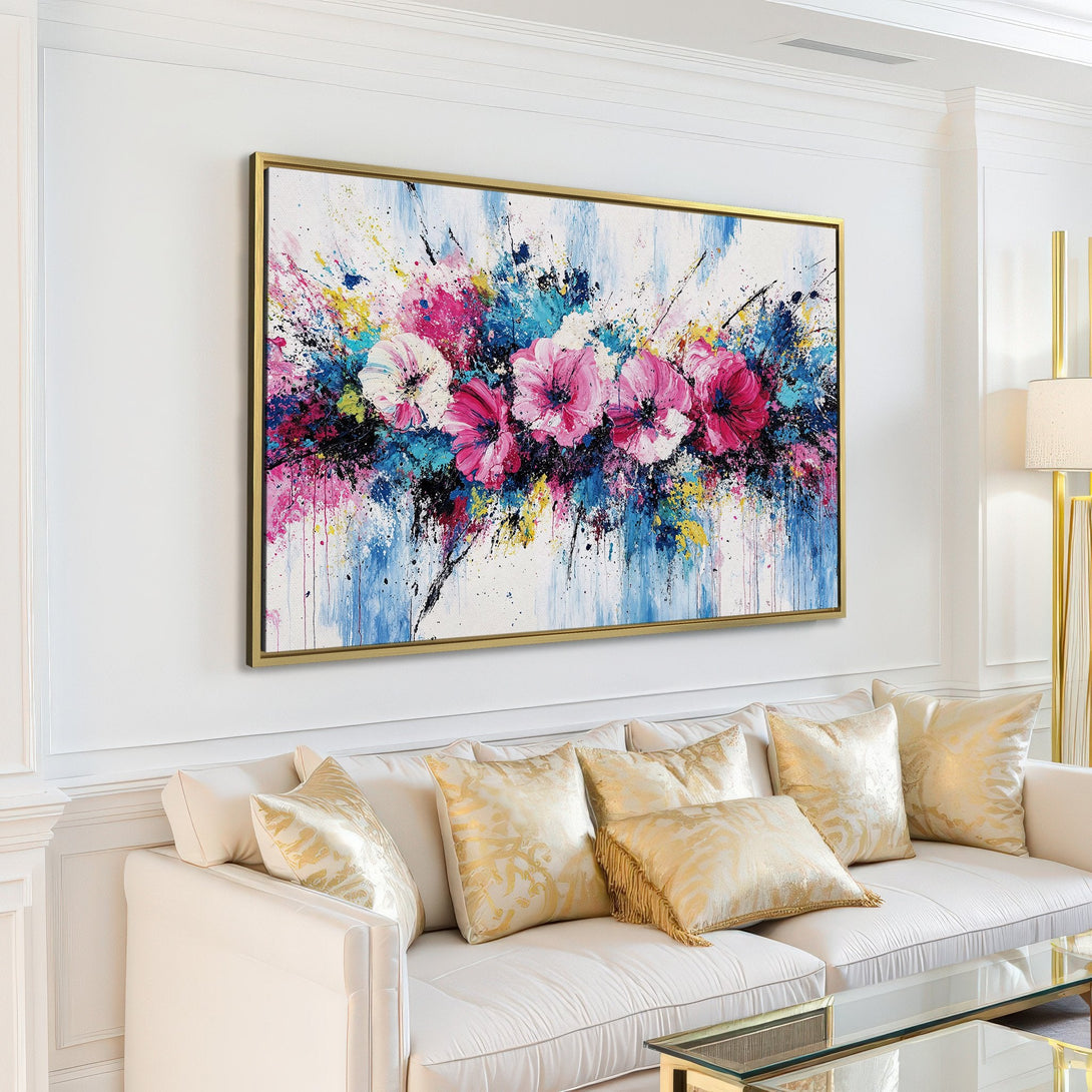 Canvas Print of vibrant abstract floral art in a modern living room. Featuring pink, blue, and yellow hues, perfect for adding a pop of color.