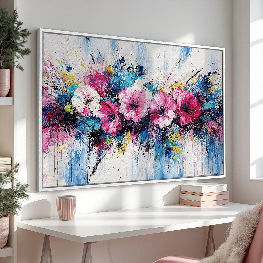 Framed Wall Art featuring abstract floral painting in vibrant pink, blue, and white. Modern art for your home.