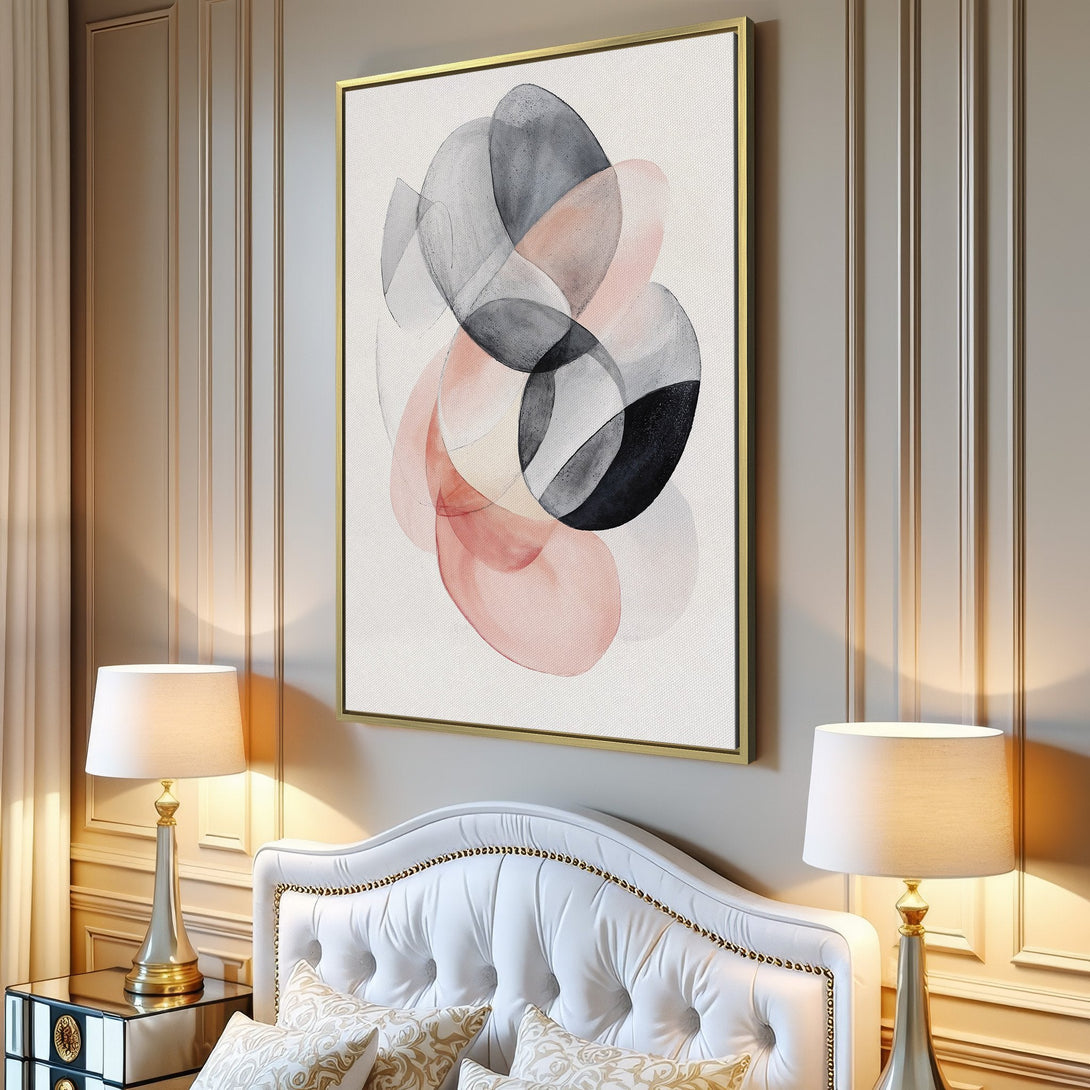 Abstract Canvas Print in a modern interior. Features overlapping watercolor shapes in blush, gray, and black. Perfect wall art for any space.