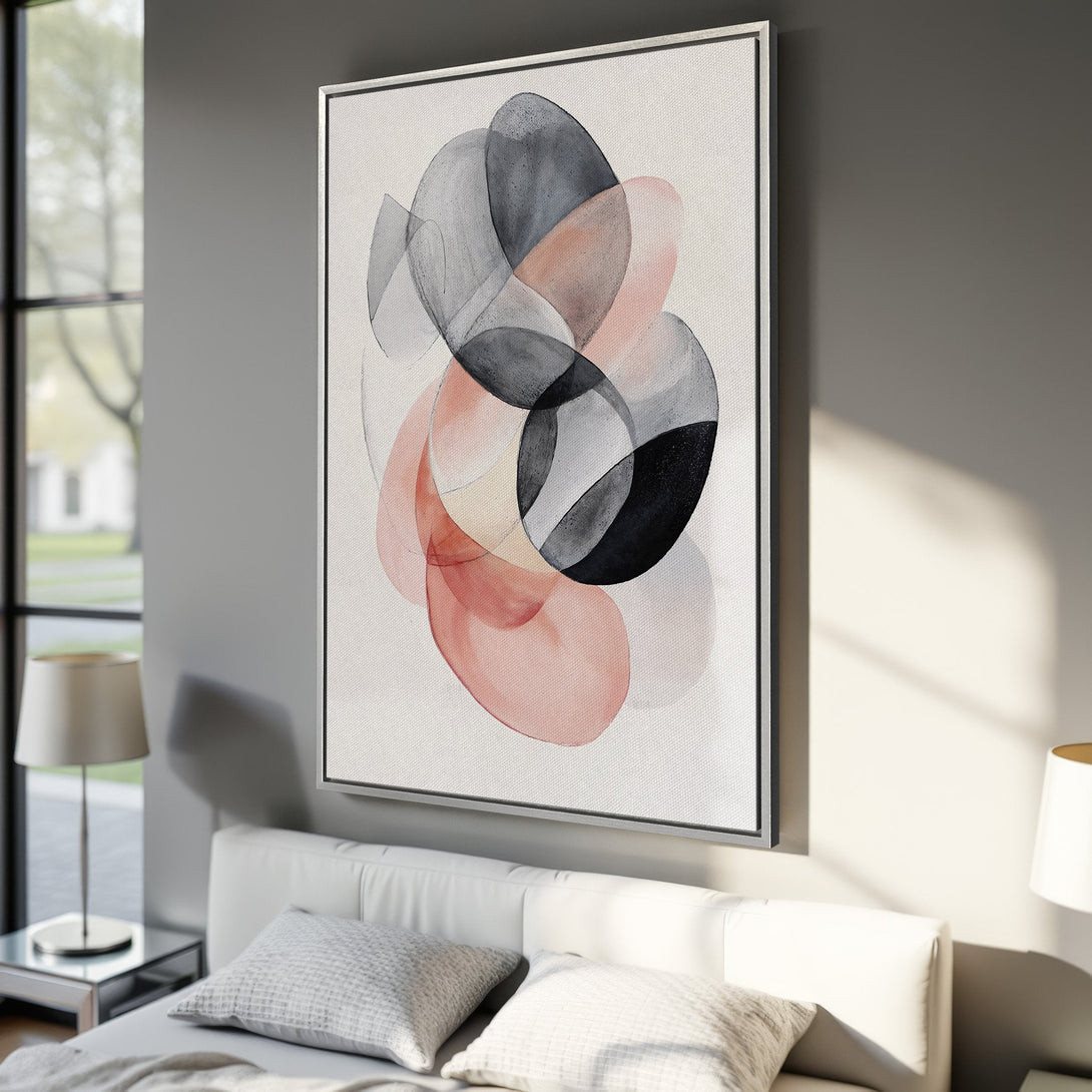 Framed Wall Art featuring abstract watercolor shapes in blush pink, gray, and black. Modern art for bedroom decor.
