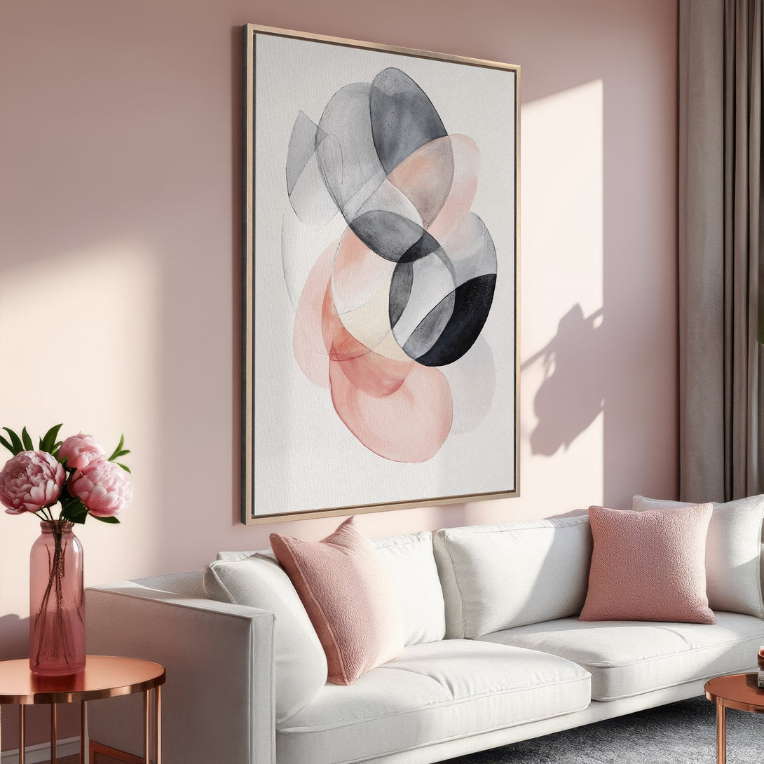 Framed Wall Art featuring abstract watercolor design in blush, gray, and black tones. Modern art for a stylish living room.