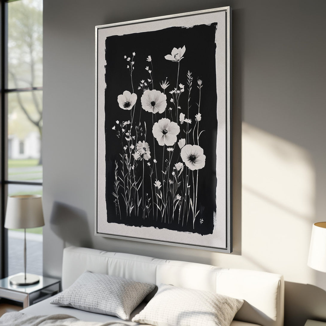 Framed Wall Art: Black & white floral canvas print. Modern botanical art in a bedroom setting. Minimalist style, perfect for home decor.