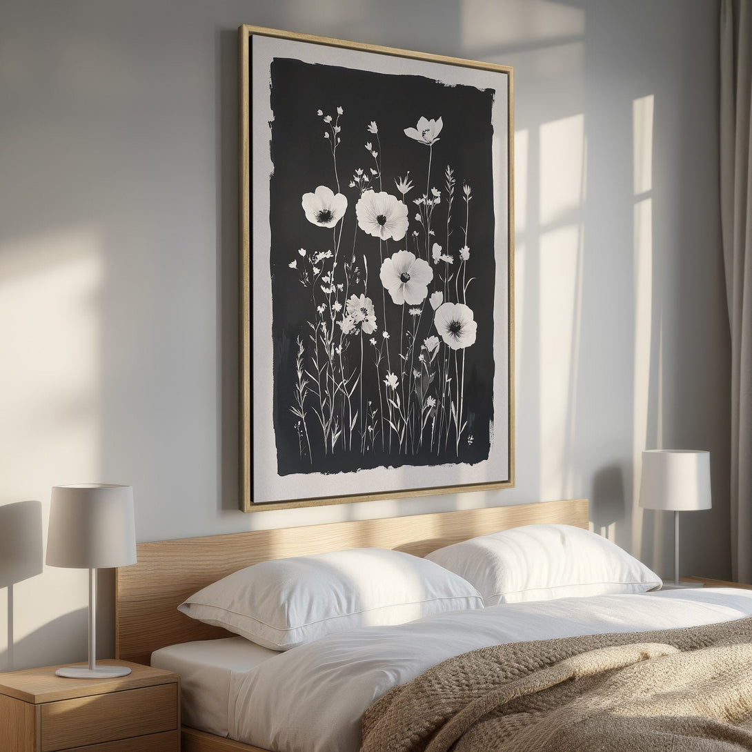 Framed Wall Art featuring elegant white floral design on a black background. Modern, minimalist style perfect for bedroom decor. Neutral color palette.