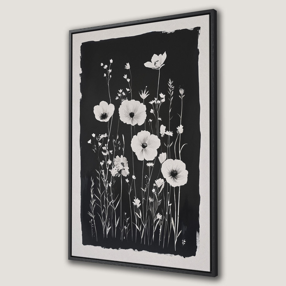 Framed Wall Art featuring a monochrome floral design. Elegant black and white canvas print of wildflowers, perfect for modern home decor.