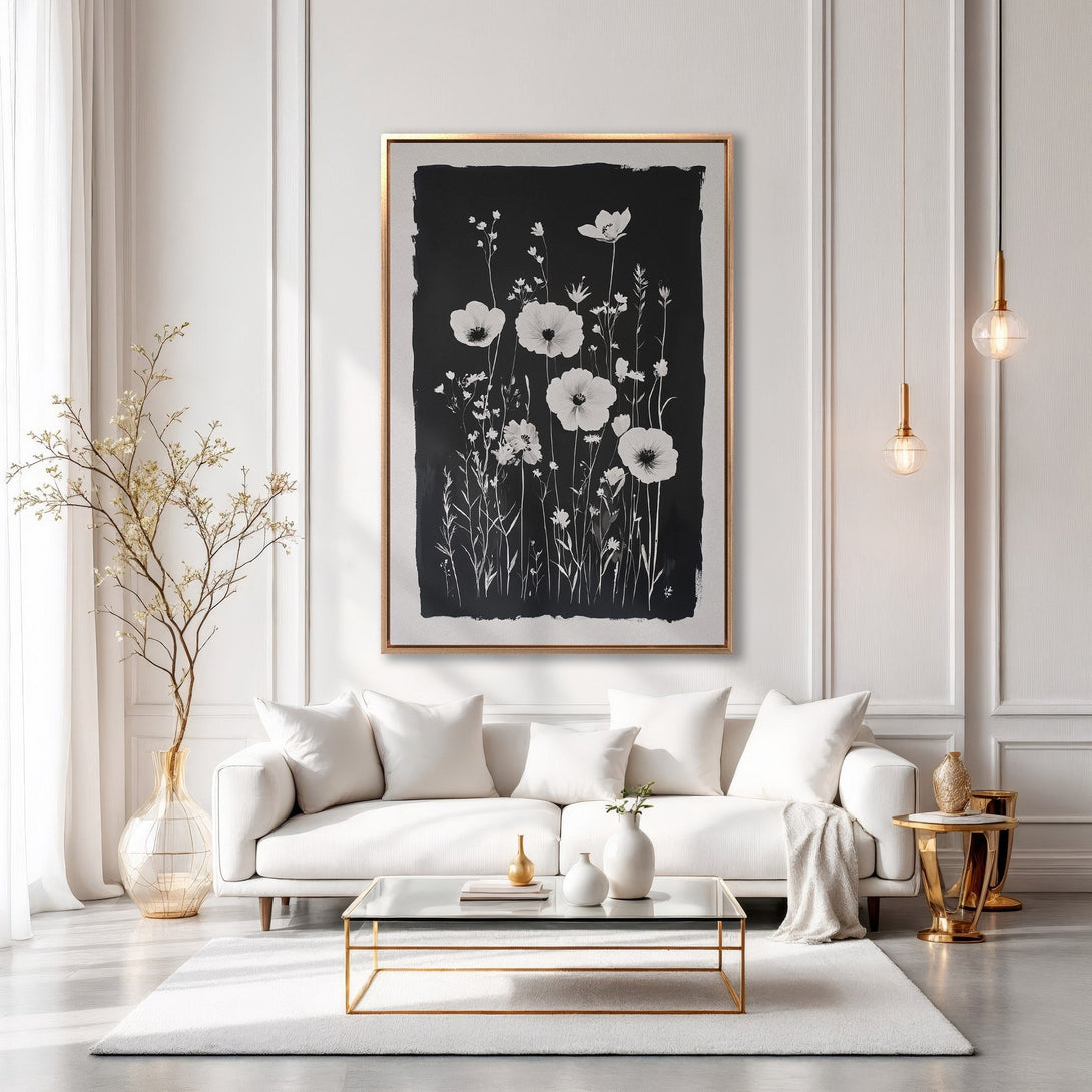 Framed Wall Art: Elegant black and white floral print canvas. Modern living room decor with gold accents. Perfect for minimalist home styling.