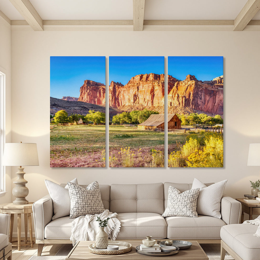 Canvas Print triptych of a scenic landscape with warm, earthy tones. Featuring a barn and mountains under a blue sky, perfect for home decor.