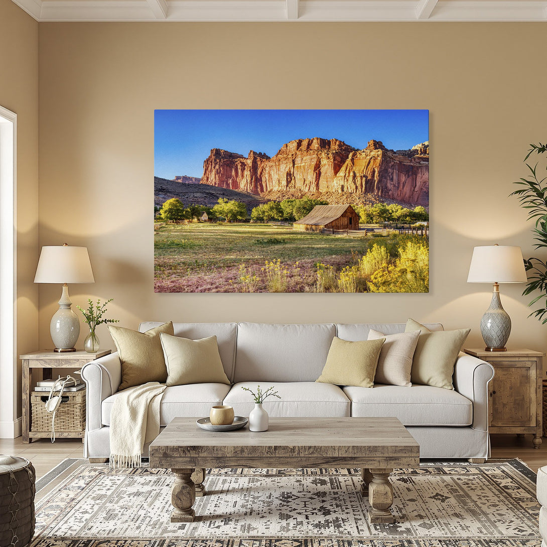 Framed Wall Art: Landscape Canvas Print of a barn scene with a warm color palette, perfect for adding rustic charm to your home.