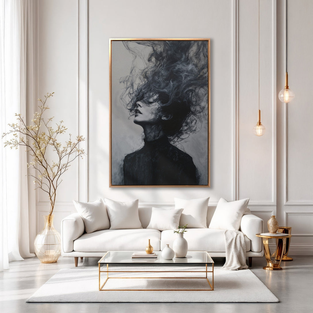 Framed Wall Art featuring a woman's portrait in a modern, monochrome style. Elegant black and gray palette complements the chic white interior.