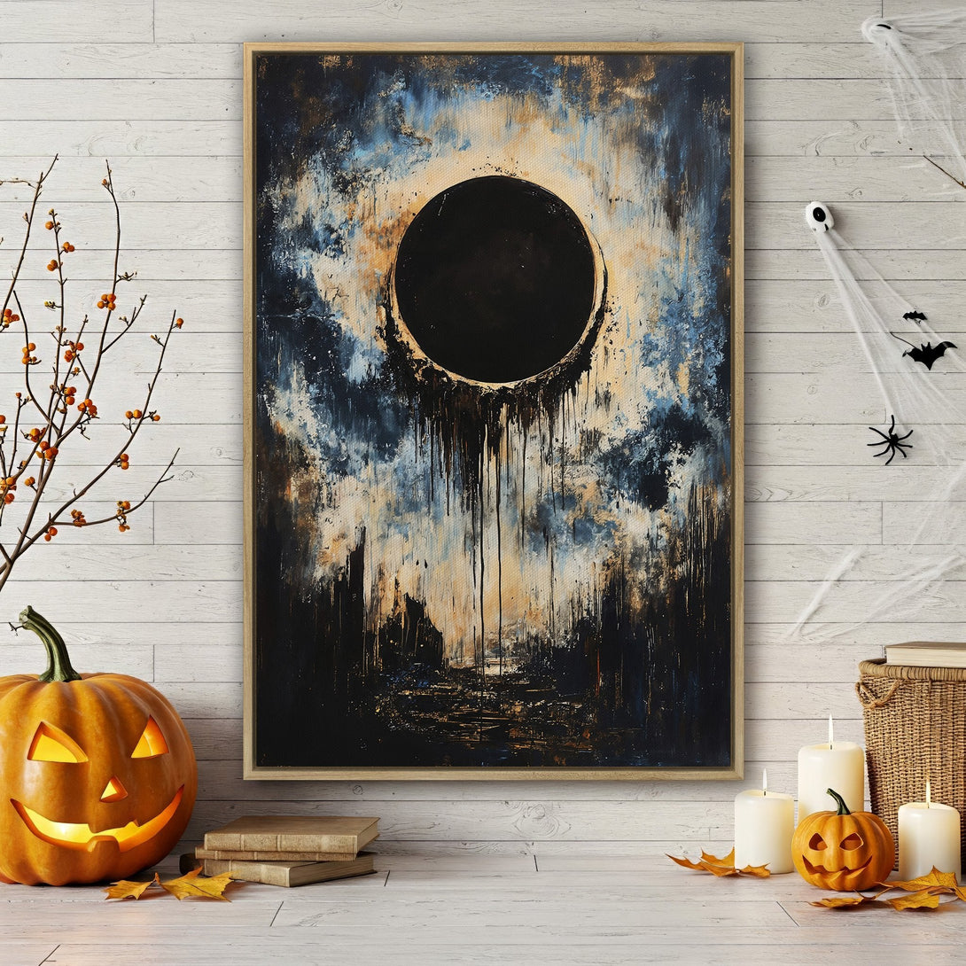 Framed Wall Art: Abstract eclipse painting in blue, black, and gold tones. Perfect for Halloween decor! Add a touch of mystery to your home.