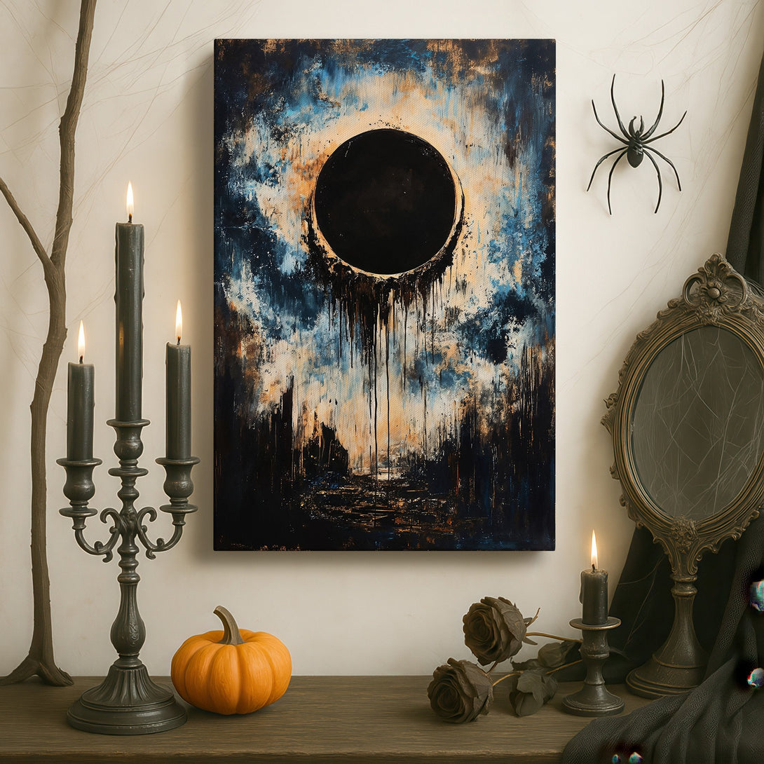 Framed Wall Art: Abstract eclipse painting in a gold frame. Dramatic blue, black, and gold color palette. Adds a touch of luxury to any interior.