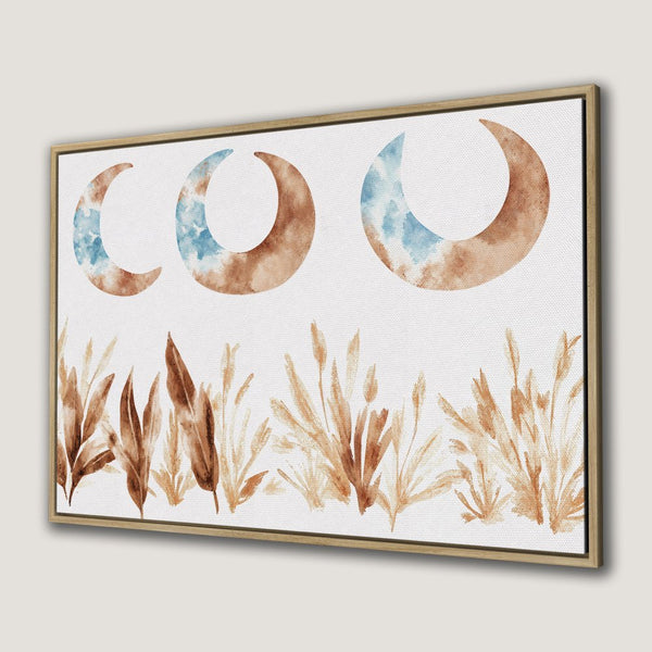 Canvas Print featuring watercolor moons and grass in a neutral, earthy color palette. Perfect boho wall art for your home!