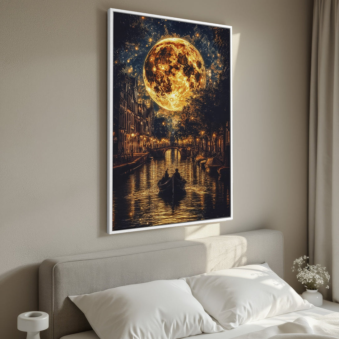 Framed Wall Art: Romantic night scene Canvas Print of Amsterdam canal under a giant moon. Warm gold and dark blue color palette for a cozy bedroom aesthetic.