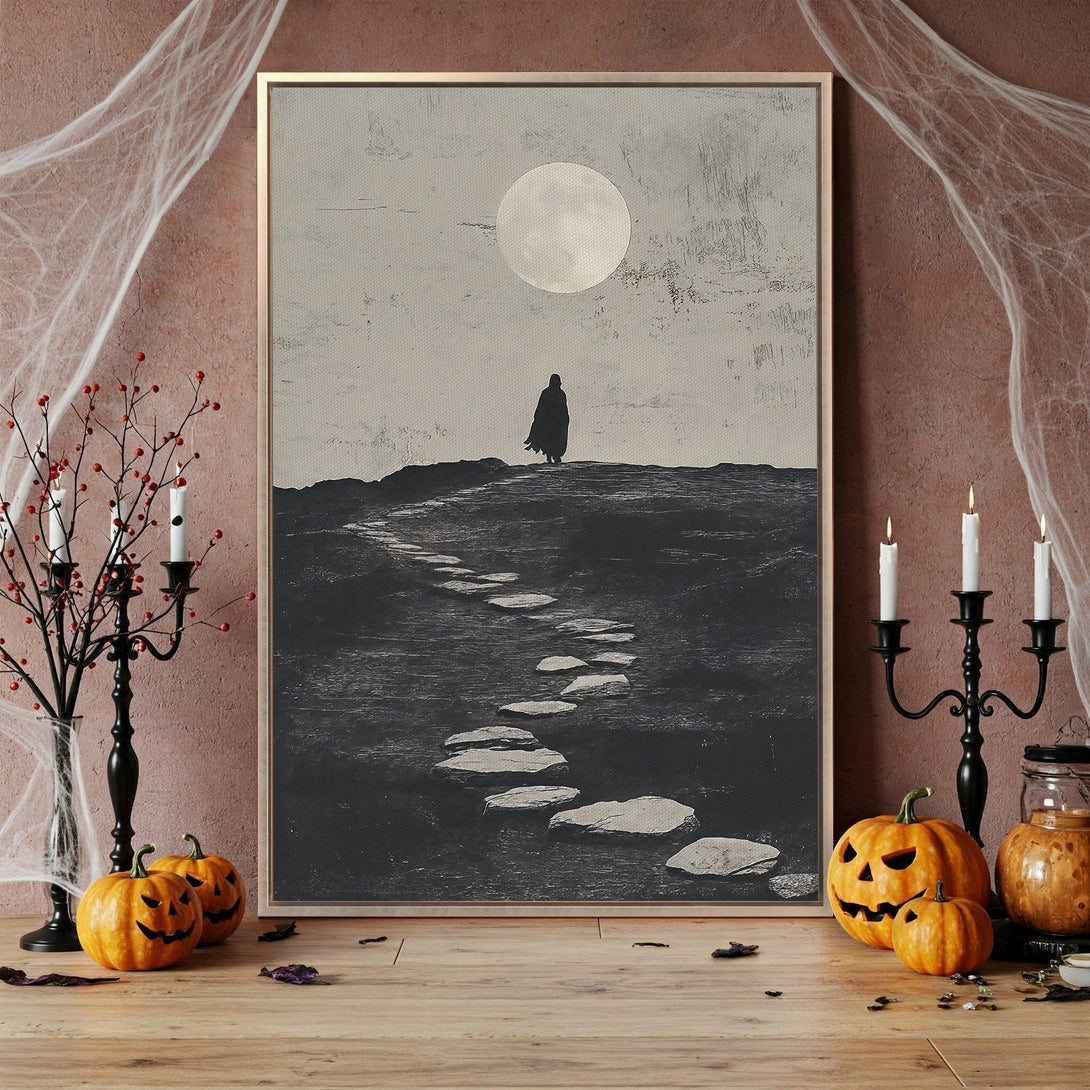 Framed Wall Art: Moody black & white landscape Canvas Print with a lone figure under a full moon. Perfect for Halloween decor!