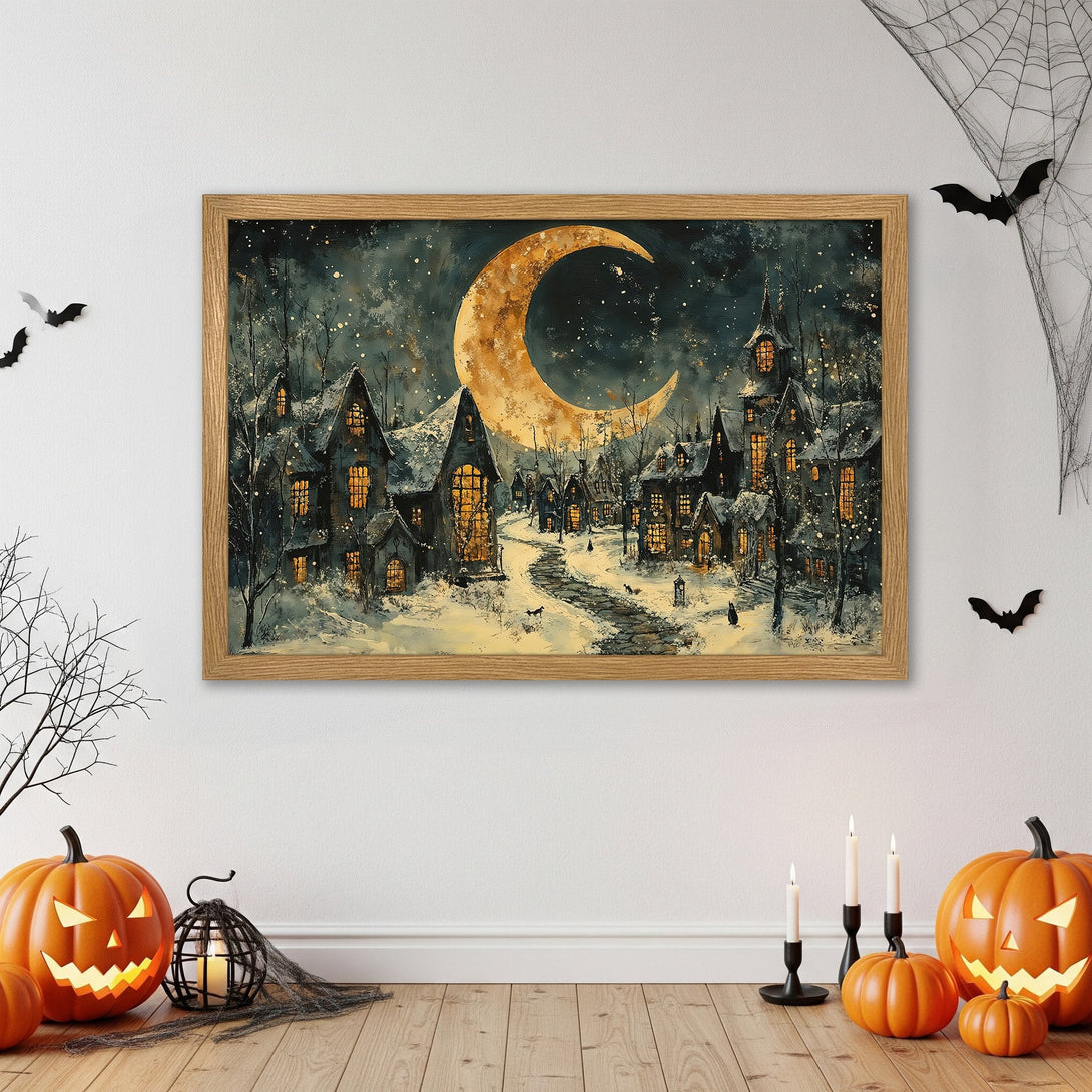 Framed Poster featuring a spooky Halloween village under a crescent moon. Watercolor style with dark blues, oranges, and yellows. Perfect wall art!