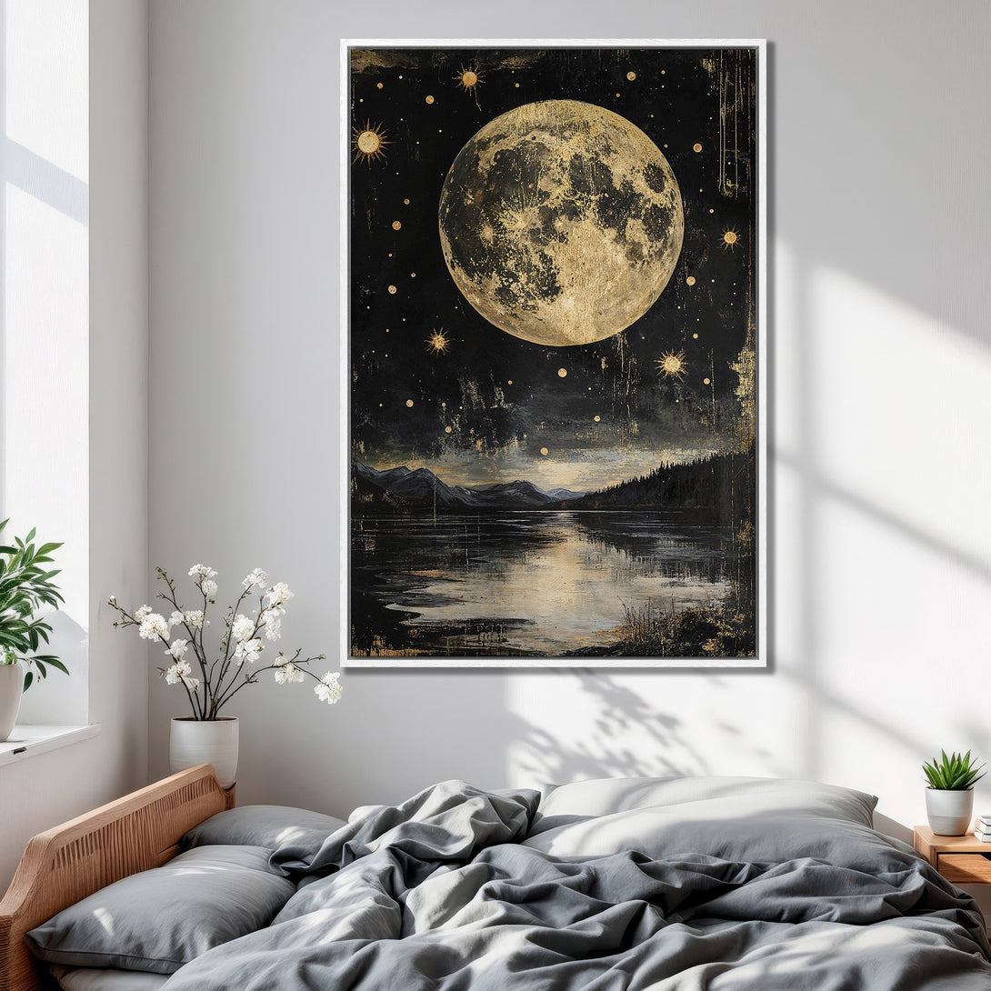 Framed Wall Art: Celestial moon and stars canvas print in a bedroom. Dark, gold, and black color palette. Adds a touch of magic to your space.