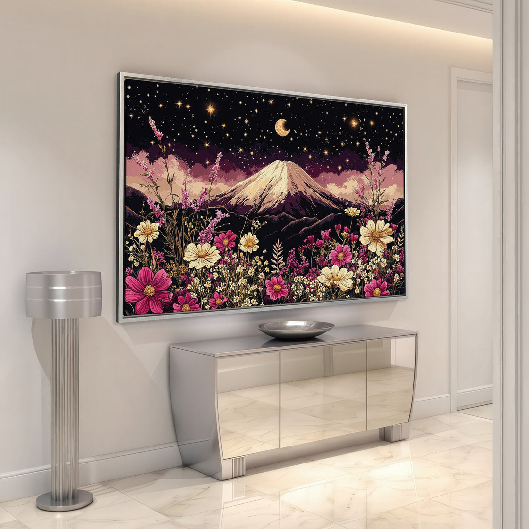 Framed Wall Art: Mountain landscape with flowers, night sky. Featuring pinks, yellows, and dark tones, perfect for adding a touch of nature to your home.