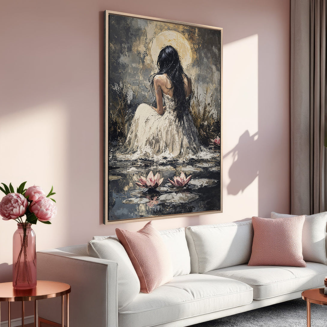 Framed Wall Art featuring a woman in a serene pond scene. Impressionistic style with a muted color palette of pinks, grays, and whites. Perfect for any home decor.