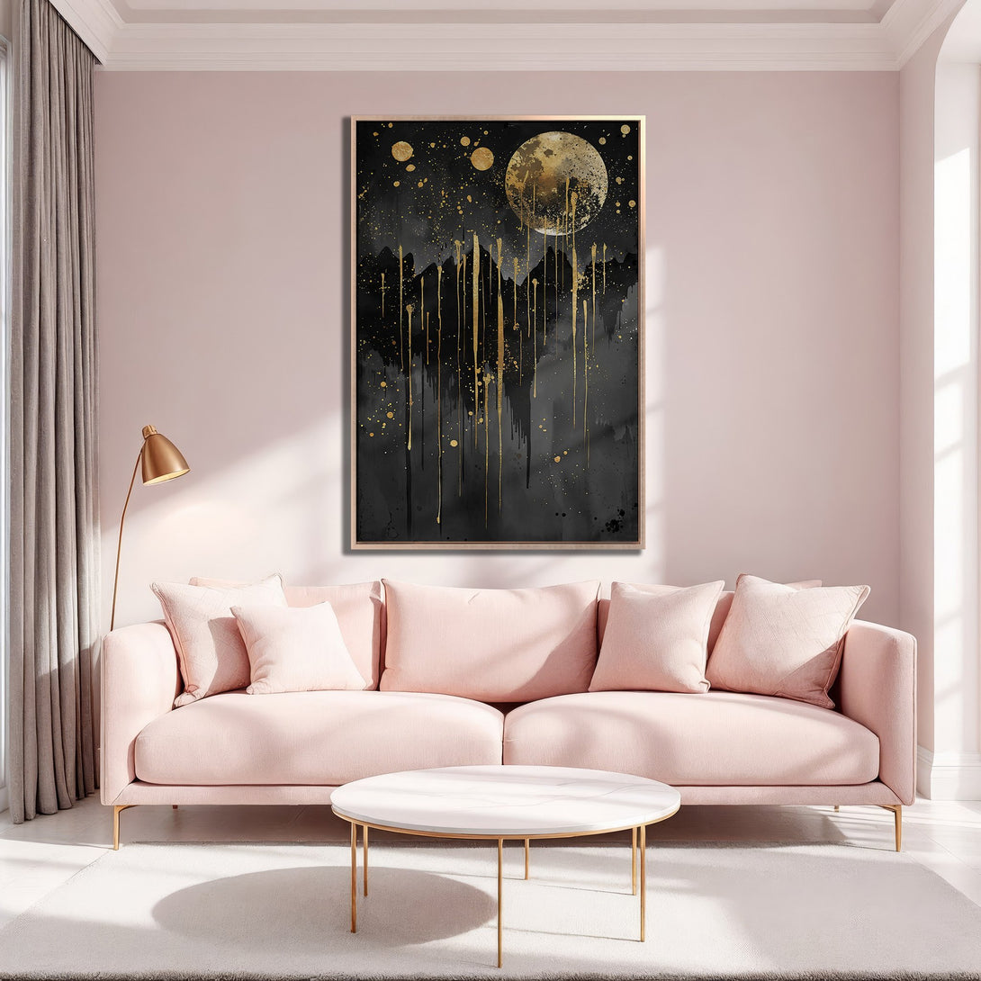 Framed Wall Art: Abstract moon and gold splatter art in a modern living room. Features a black, gold, and pink color palette for a stylish interior.
