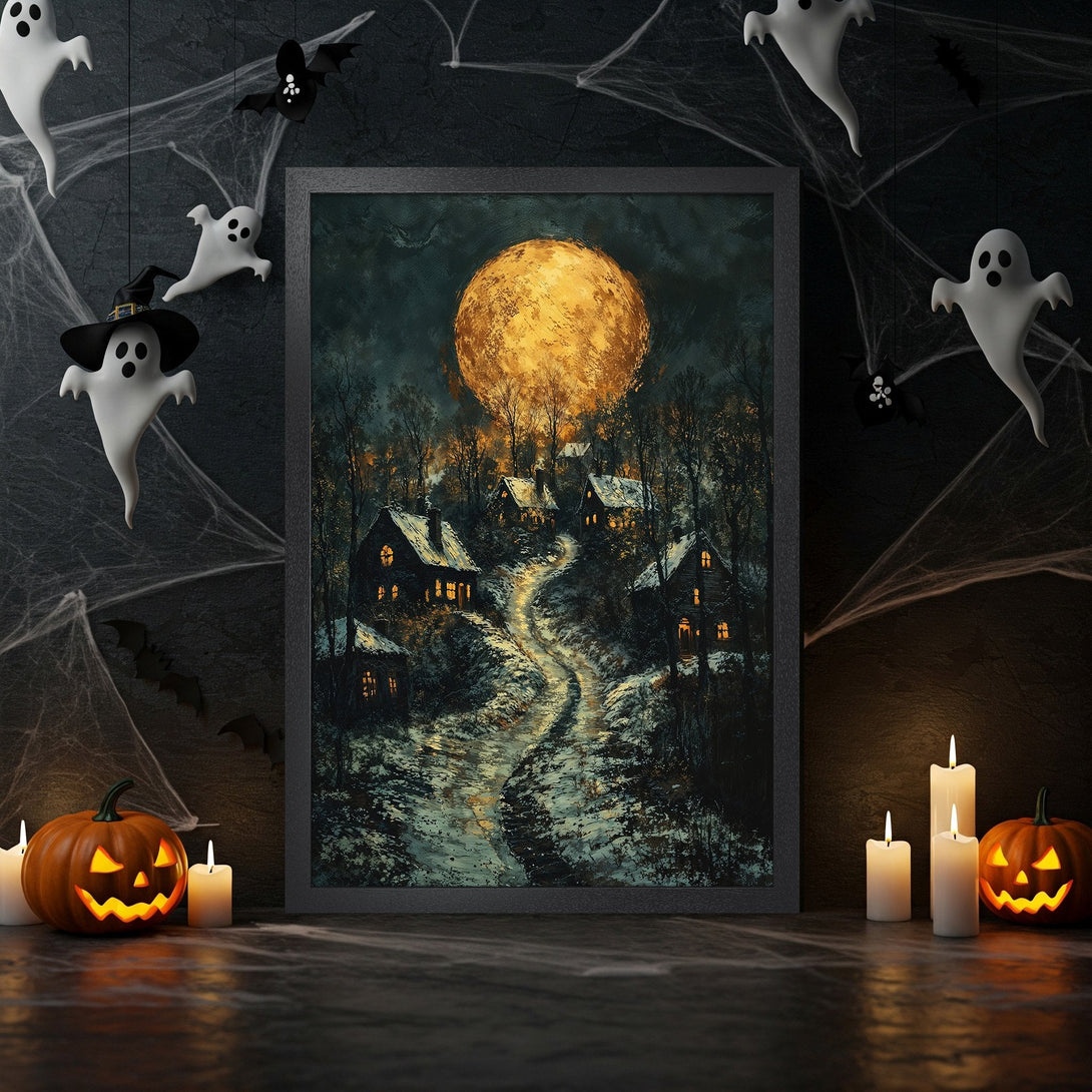 Framed Poster of a spooky village scene with a full moon, in a dark, moody color palette. Perfect Halloween decor!