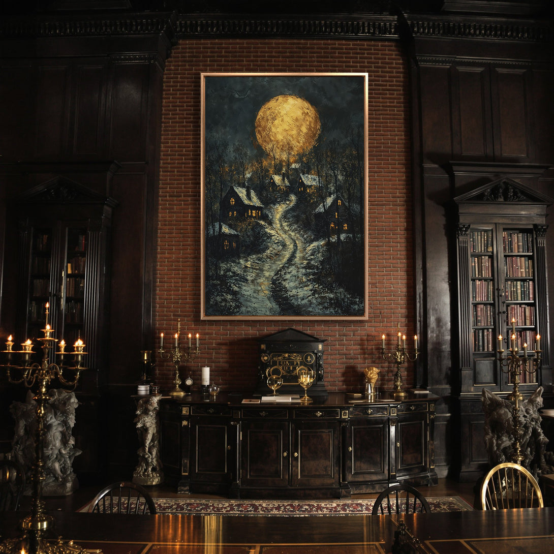 Framed Wall Art: Dramatic landscape canvas print with a glowing moon over a village, in a dark, moody color palette. Perfect for adding a touch of mystery.