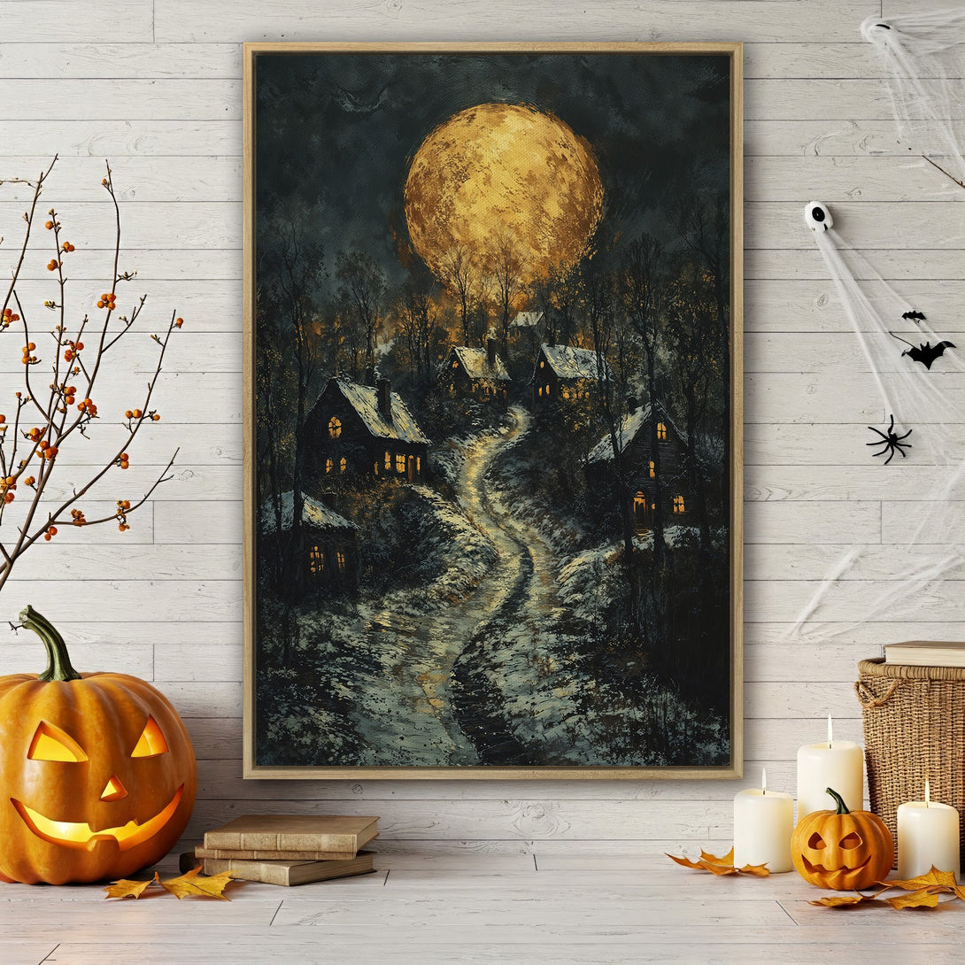 Framed Wall Art: Spooky village under a golden moon. Dark, moody painting with warm, glowing accents. Perfect Halloween decor!