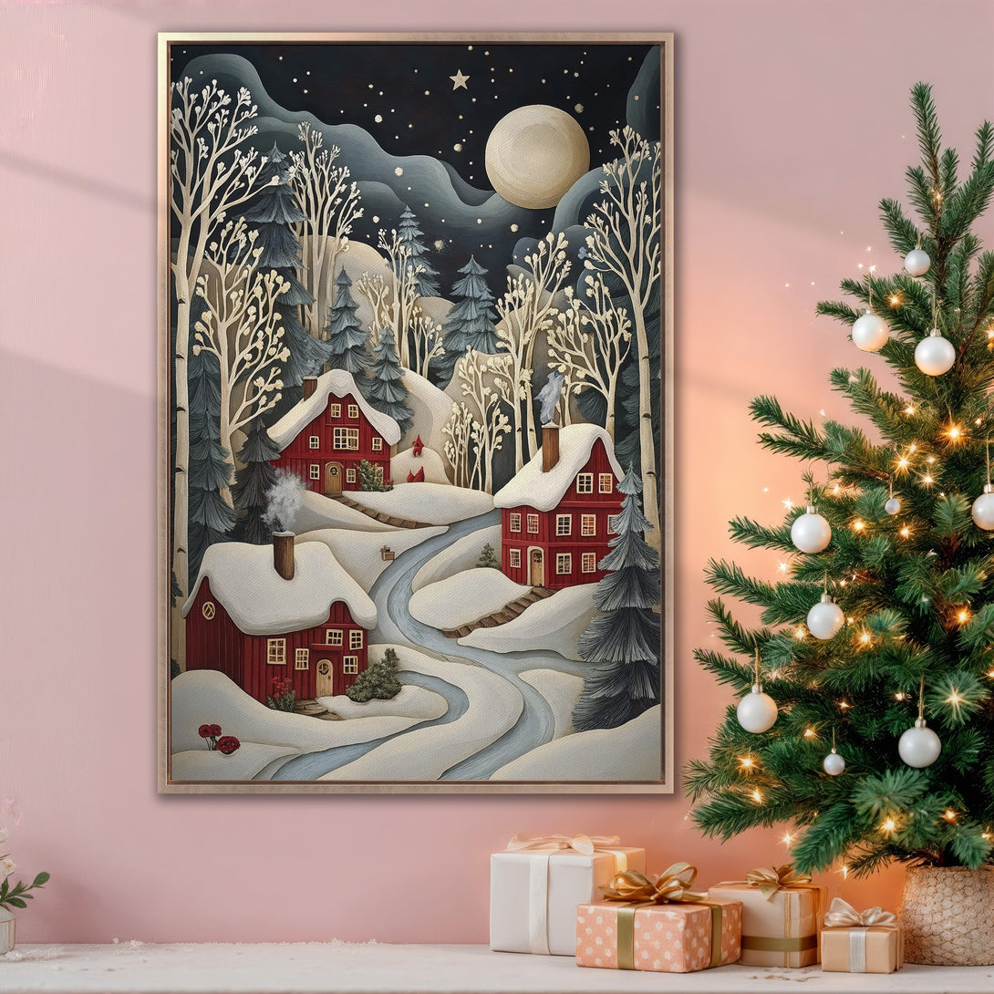 Framed Wall Art: Winter landscape scene with red houses, snowy trees, and a full moon. Cozy, whimsical art in a cool, muted color palette. Perfect holiday decor!