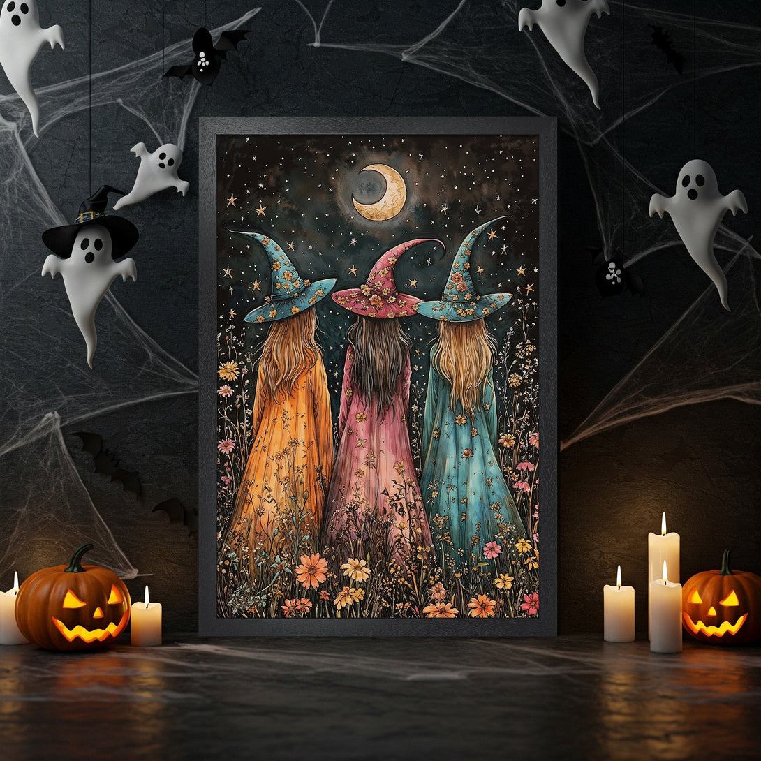 Framed Poster featuring three witches under a starry moon. Whimsical style, vibrant floral dresses, and a dark, Halloween color palette. Perfect for spooky decor!
