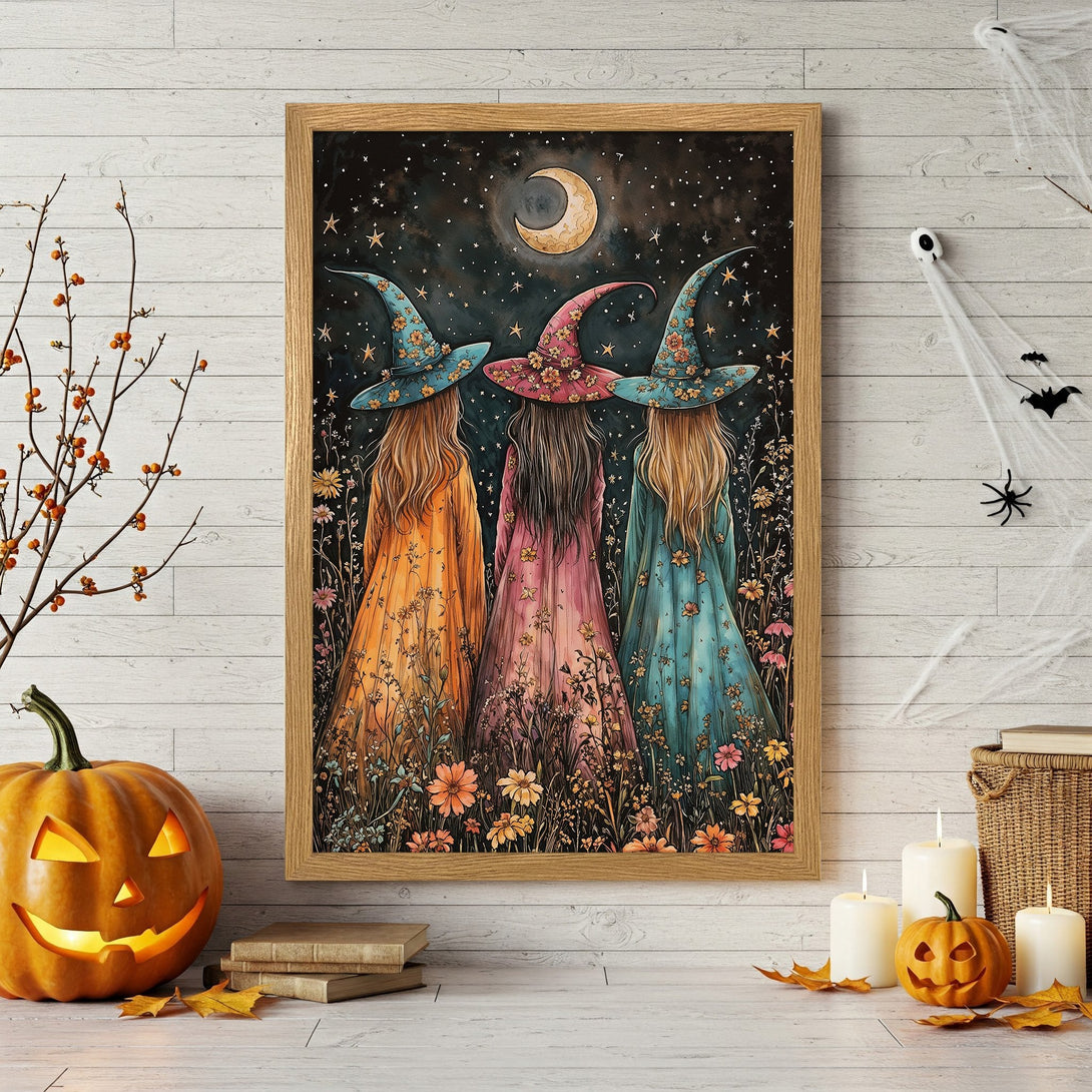 Framed Poster featuring three whimsical witches under a starry night sky. Watercolor style, warm color palette perfect for Halloween decor.