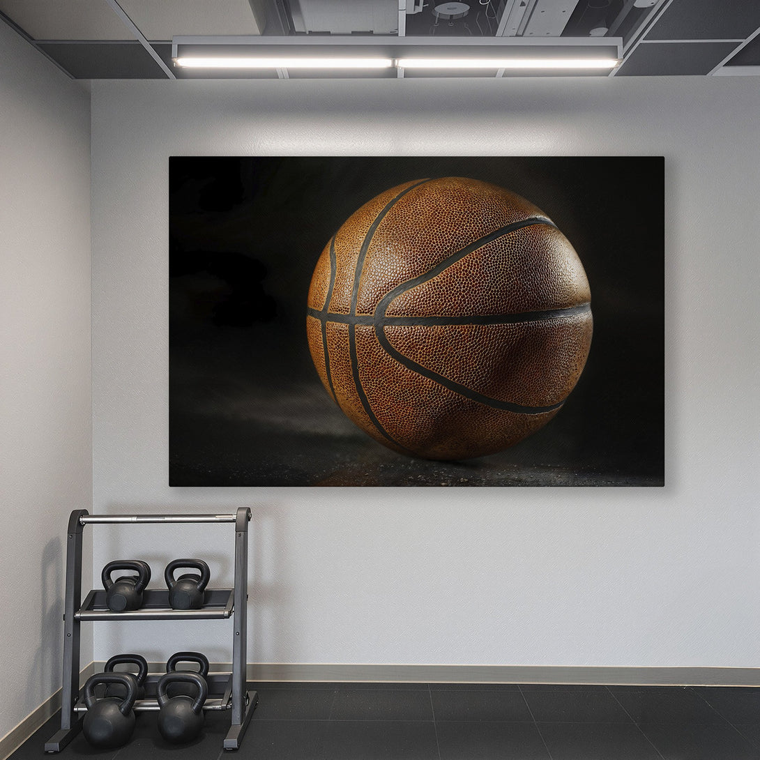 Framed Wall Art: Stunning basketball canvas print in a modern gym setting. Rich brown tones pop against the teal walls. Elevate your space with this stylish artwork.