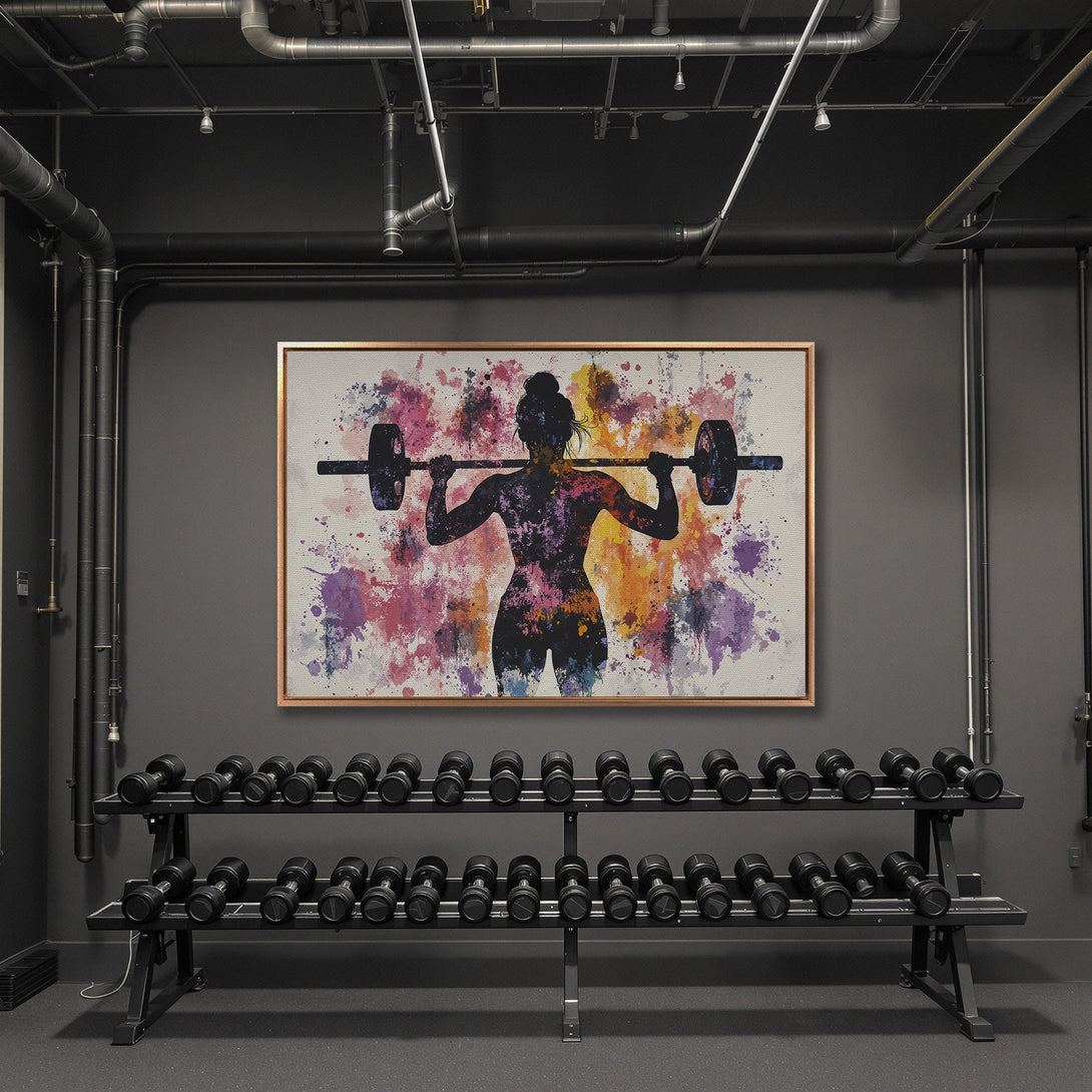Framed Wall Art: Watercolor silhouette of a woman lifting weights. Colorful abstract background. Modern gym decor with a vibrant, artistic touch.