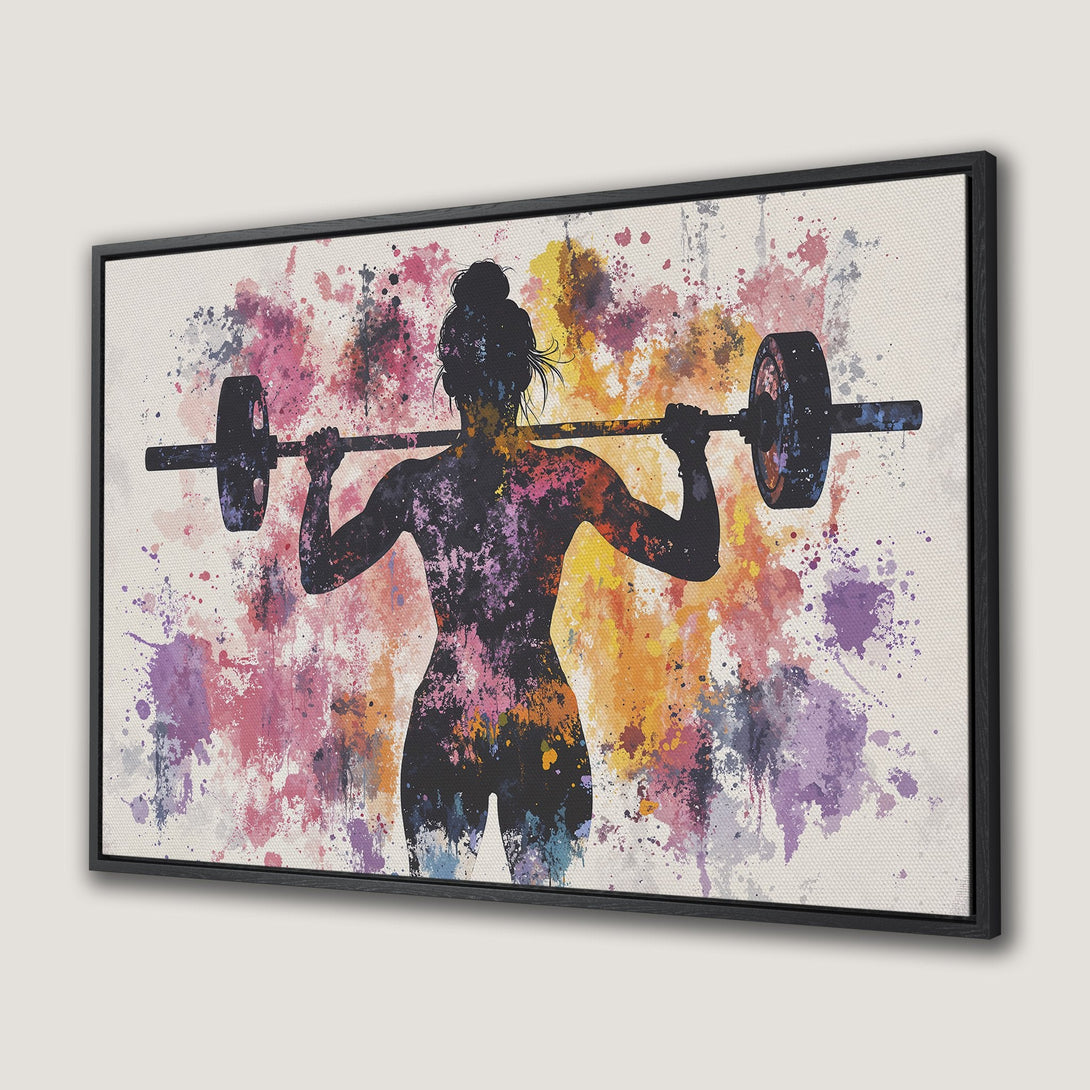 Framed Wall Art: Watercolor silhouette of a woman lifting weights. Vibrant, colorful abstract art with pink, purple, and yellow accents. Perfect for home gym decor.