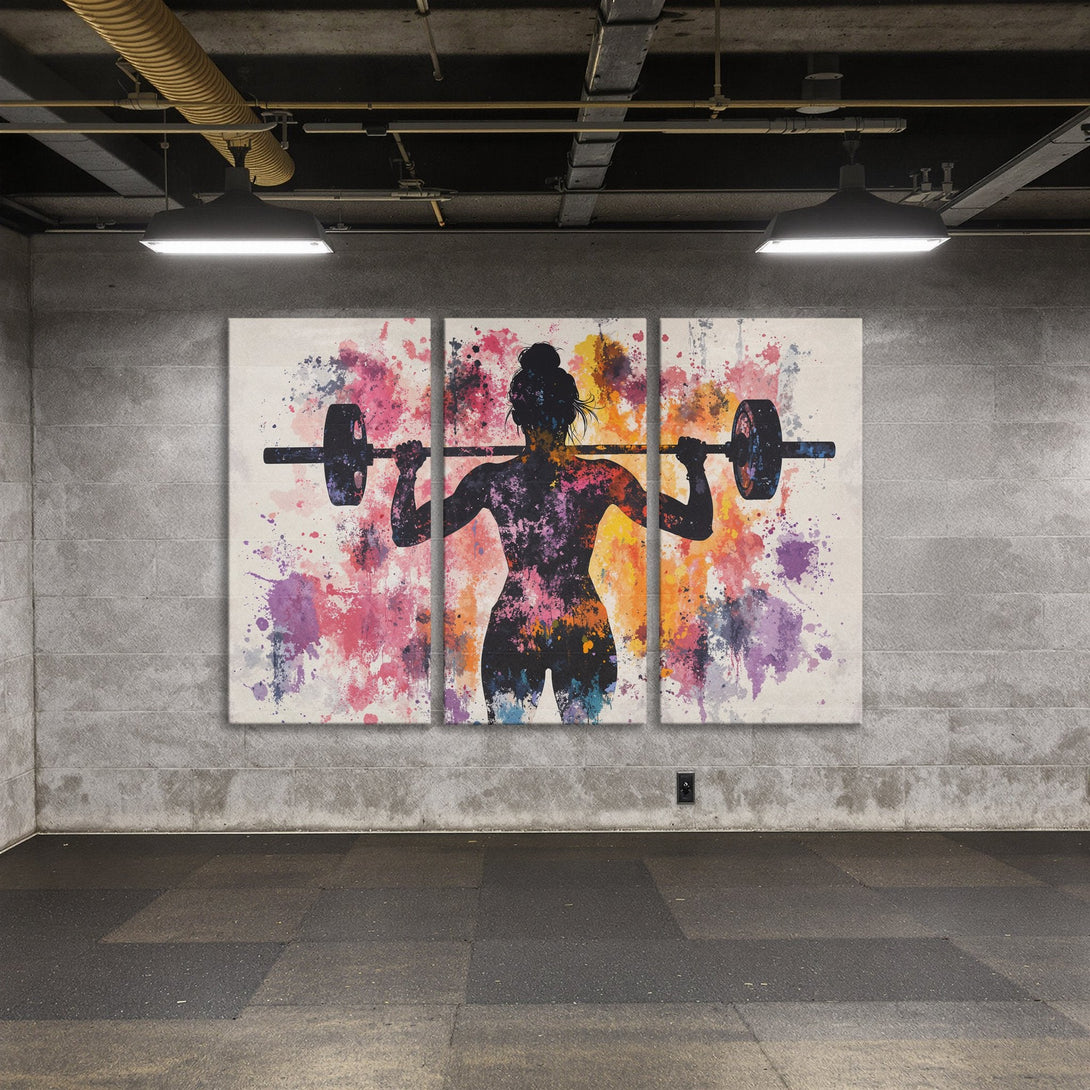Canvas Print: Abstract watercolor art of a woman lifting weights. Vibrant pink, purple, and orange splashes on a neutral background. Perfect gym decor.