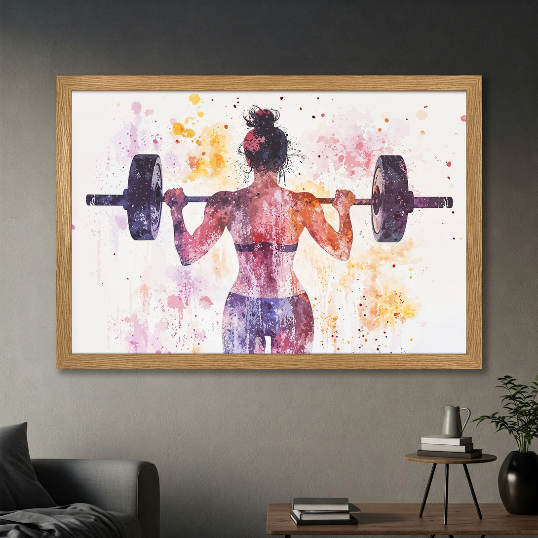 Framed Poster of a watercolor woman lifting weights. Artistic style with a vibrant pink, orange, and purple color palette. Perfect for gym decor.