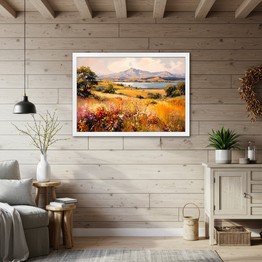 Framed Poster of a vibrant landscape painting with mountains, lake, and wildflowers. Warm, earthy tones create a cozy, inviting style.