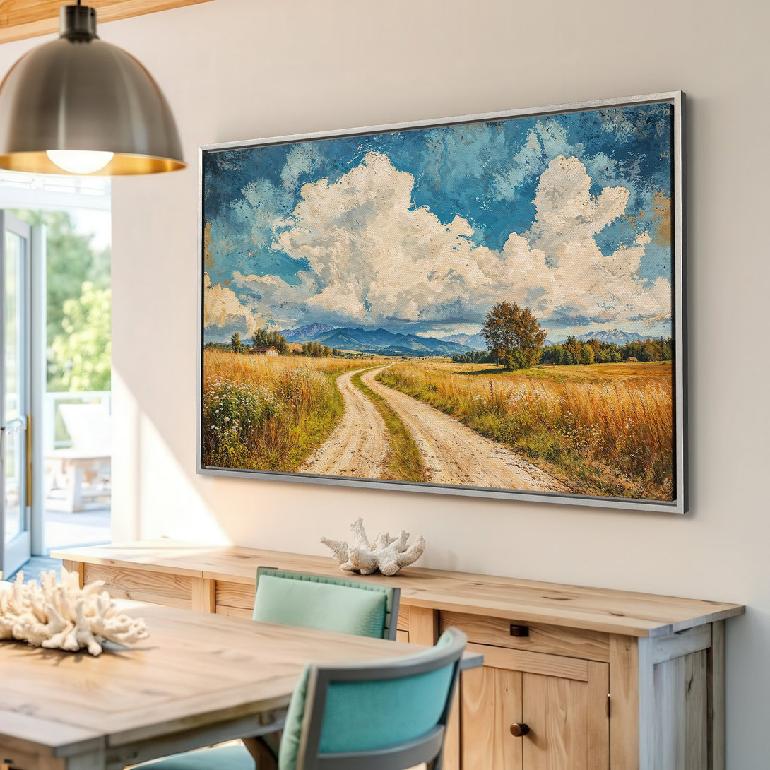 Framed Wall Art: Landscape Canvas Print with a dirt road, blue sky, and golden fields. Rustic style with warm, inviting color palette.