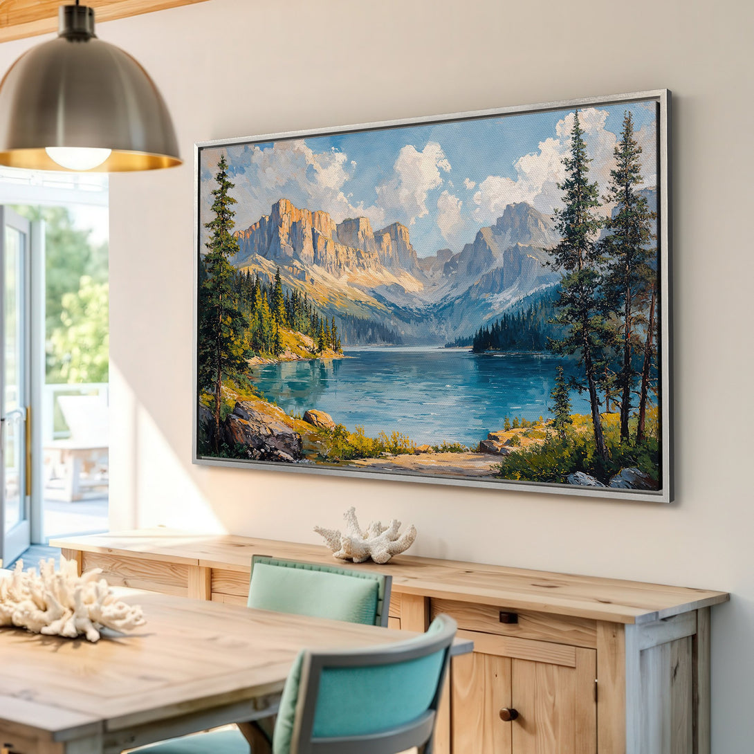 Framed Wall Art: Mountain lake landscape canvas print in a bright interior. Features blue, green, and gold color palette. Perfect for adding a touch of nature.