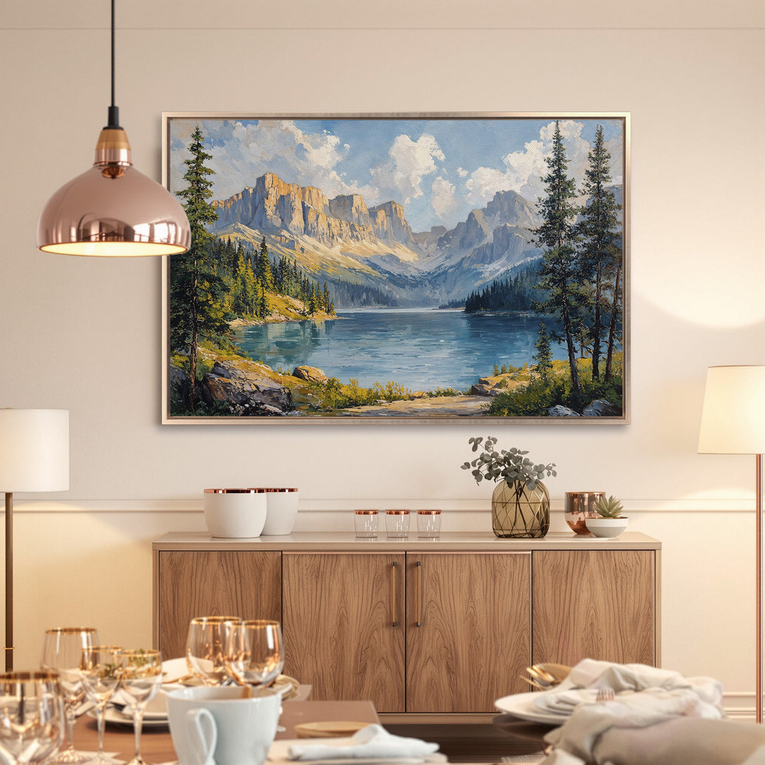 Framed Wall Art: Mountain lake landscape painting in a neutral interior. Features blue, green, and gold color palette. Perfect for adding nature to your home.