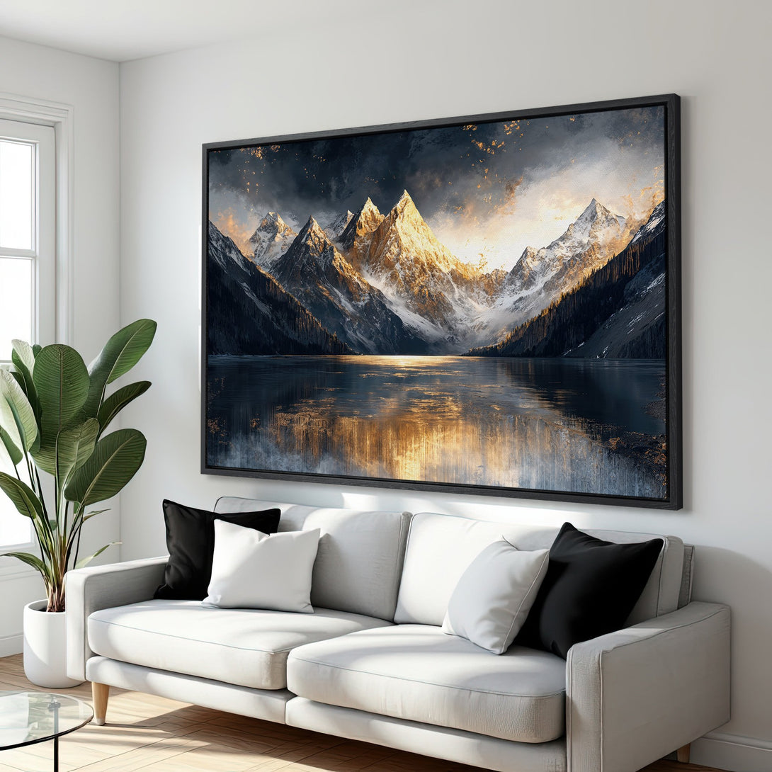 Framed Wall Art of majestic mountains reflecting in a lake. Dramatic landscape in a cool, moody palette with gold highlights. Elevate your space!