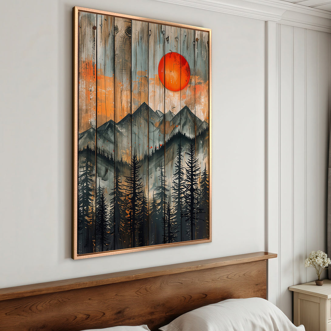 Framed Wall Art: Mountain landscape Canvas Print with a rustic style, featuring a vibrant orange sun and a cool gray and orange color palette.