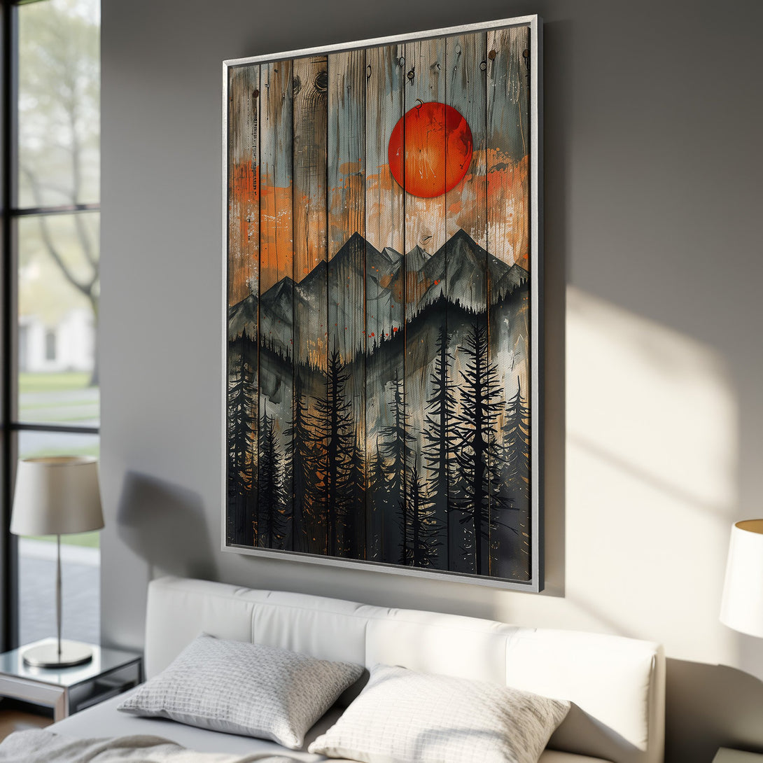 Framed Wall Art: Rustic mountain scene Canvas Print with a bold red sun, silhouetted trees, and a warm, earthy color palette. Perfect for any interior!