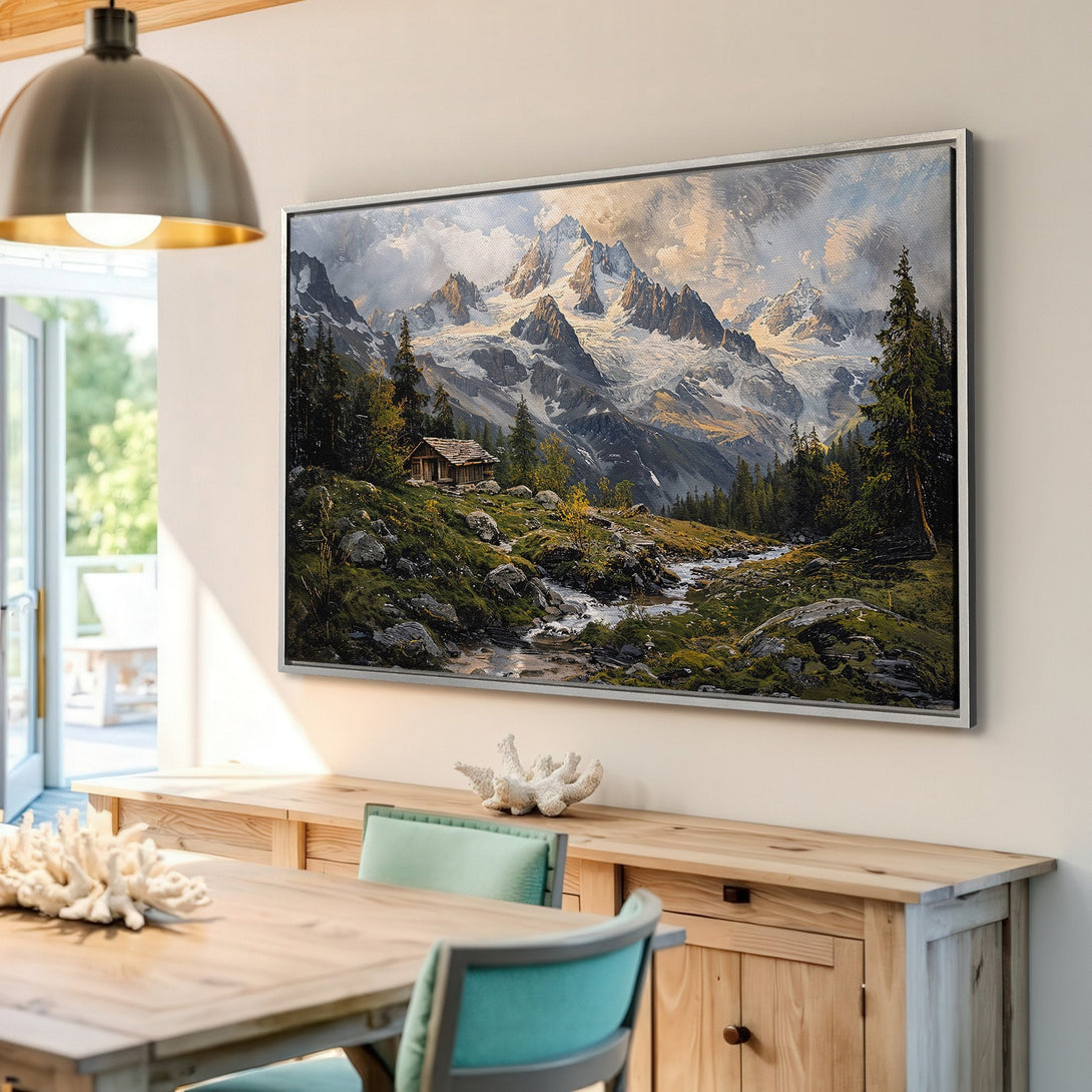 Framed Wall Art: Mountain landscape canvas print with a cabin, featuring a natural green and blue color palette, perfect for home decor.