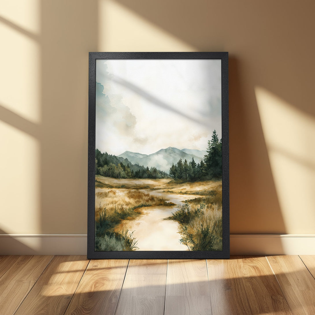 Framed Poster of a serene watercolor landscape with mountains, trees, and a river. Earthy tones create a calming aesthetic. Perfect wall art!