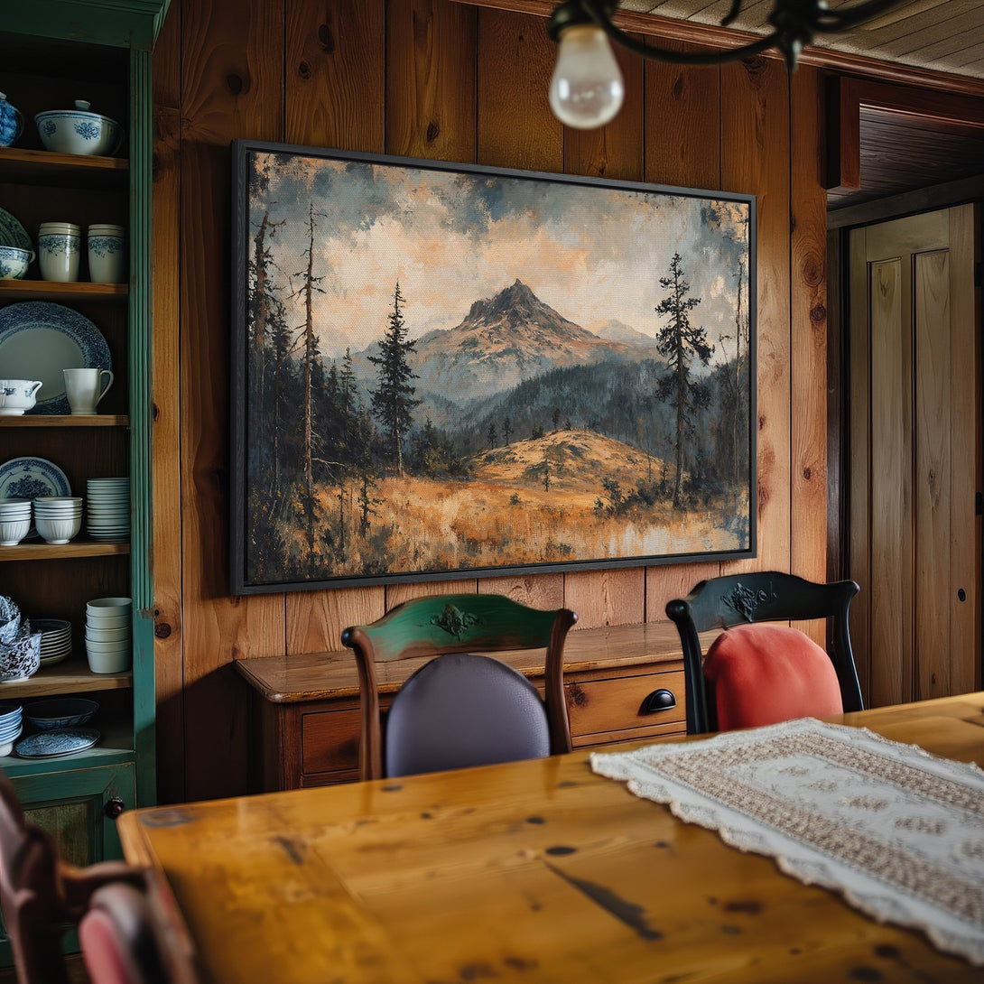 Framed Wall Art: Mountain landscape canvas print in a rustic interior. Features a moody, earthy color palette. Perfect for home decor!