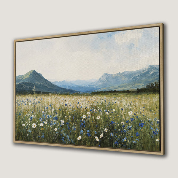 Framed Wall Art featuring a serene landscape painting with wildflowers and mountains. Soft, impressionistic style with blue, green, and neutral color palette.