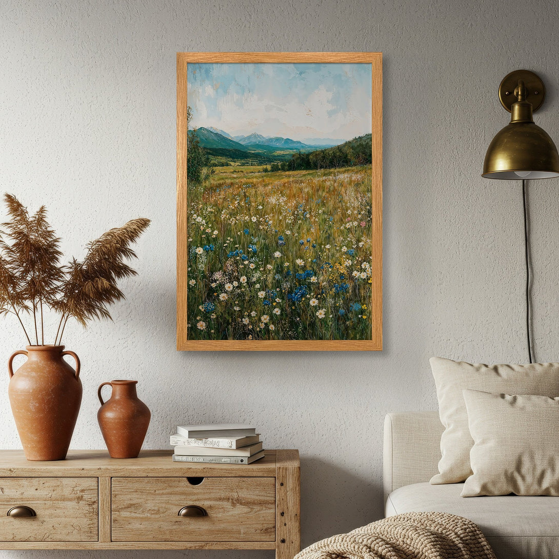 Framed Poster of a serene landscape painting, featuring a field of wildflowers with a blue, green, and yellow color palette. Perfect wall art!