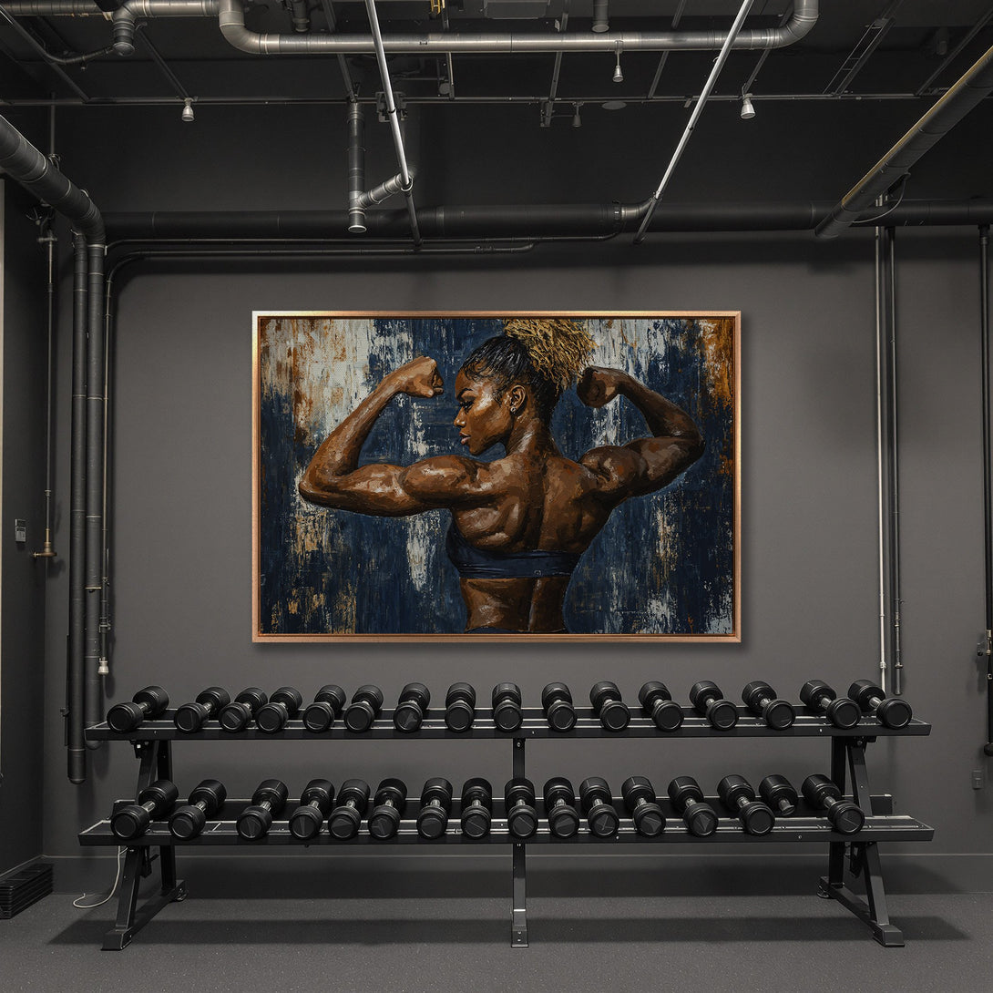 Framed Wall Art of a powerful woman flexing muscles, displayed in a gym. Abstract style with blue, brown, and gold tones. Perfect for home or gym decor.