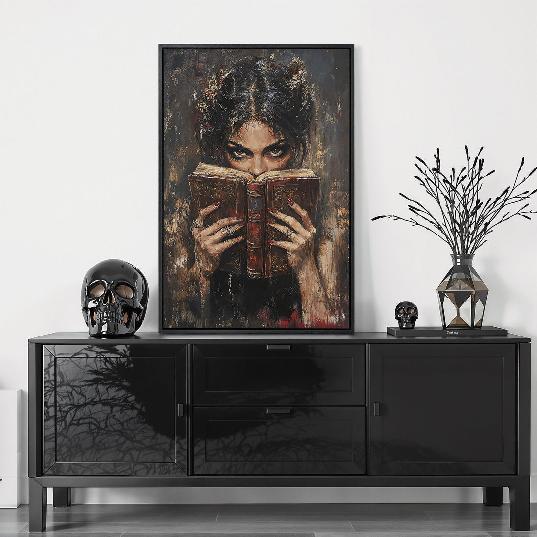 Framed Wall Art featuring a woman reading, in a dark, moody style with a brown and black color palette. Perfect for adding a touch of mystery to your home.
