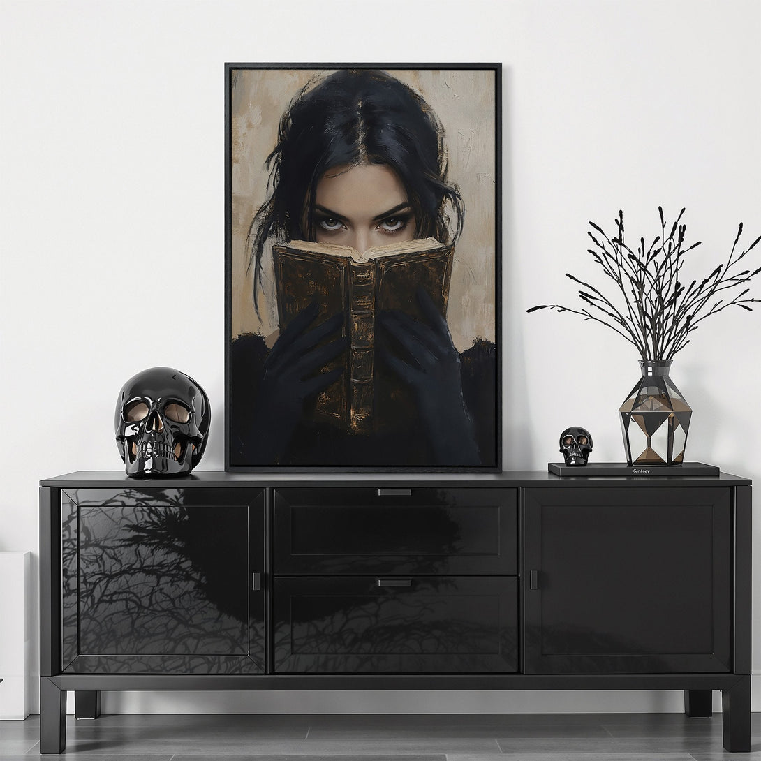 Framed Wall Art: Moody portrait of a woman reading. Dark, gothic style with a neutral color palette. Perfect for adding a touch of mystery to your space.